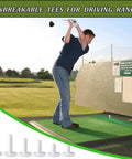 Person using Durable Rubber Golf Tees 6 Pack For Driving Range And Indoor And Outdoor Practice Mat Three And A Quarter Inch Long