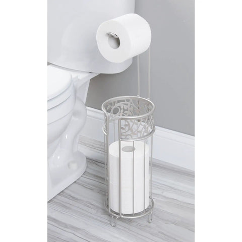 Freestanding Toilet Paper Holder No Drill Install Holds 3 Spare Rolls Matte Silver Bathroom Dispenser beside toilet.