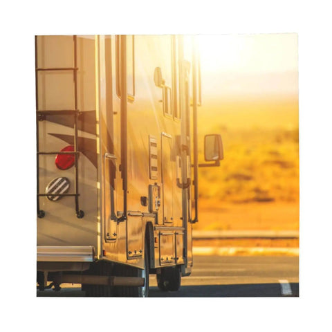 Side view of Class C motorhome at sunset, ideal for use with Breathable 22x22 Inch Square Bandana For Adults Built For Camping And RV Trips