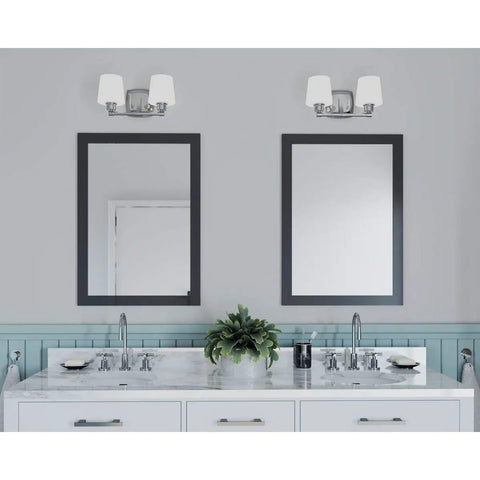 Bathroom with Glance Two-Light Bath Vanity Light In Brushed Nickel With Etched Linen Glass Shades, above mirrored sinks