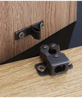 Six Pack Cabinet Latch With Double Roller Catch Hardware shown on wooden cabinet door, bronze finish, durable nylon and nickel plated steel.