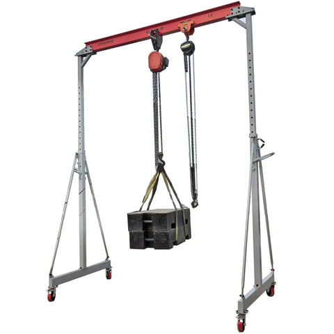 Beefed Up Heavy Duty Gantry Crane 2000 Lb Portable Lift With Trolley Hoist And Rigging Kit lifting weight in workshop.