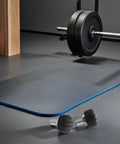 Roller Skate Toe Stops Set With Adjustable Rubber Brakes For Quad Skates shown on gym floor next to weights