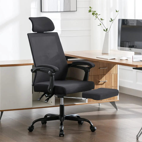 Mesh Ergonomic Office Chair With Footrest Headrest And Adjustable Backrest 90 To 135 Degrees 360 Degree Swivel Wheels next to desk