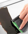 Cleaning a Sturdy Portable Stainless Steel Tool Box With Metal Latch surface using a cloth, highlighting easy maintenance.