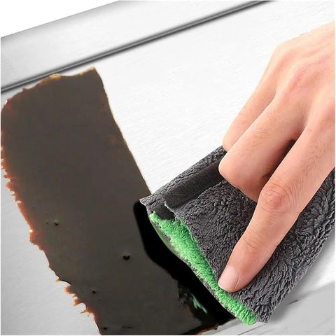 Cleaning a Sturdy Portable Stainless Steel Tool Box With Metal Latch surface using a cloth, highlighting easy maintenance.