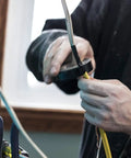 Person using Contractor Favorite Pro Grade Multicolor Electrical Tape 10 Pack Three Quarters Inch By 66 Feet Waterproof on wiring