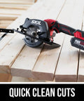 Super Compact One Handed Cordless Circular Saw Kit With Four And A Half Inch Blade Brushless Motor 20V Lithium Battery And Charger on wooden planks.