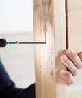 Number 12 14 X 6 3 8 Inch Multipurpose Screws Featuring Fast Bite Zip Tip Tech being installed into wood for framing.