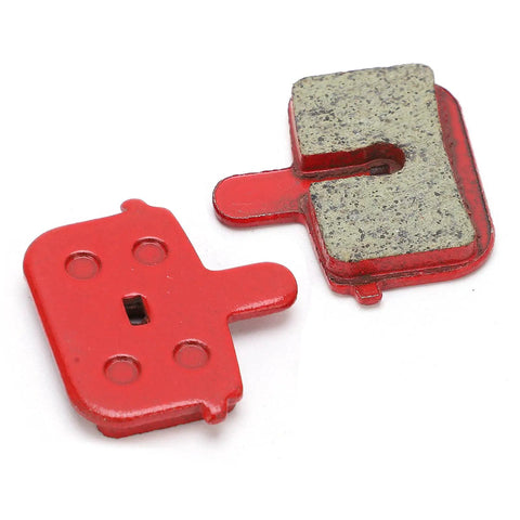 4 Pairs Resin Semi Metal Brake Pads Replacement For Electric Vehicles And Mountain Bikes Go To Quiet Braking With High Temperature Resistance And Long Wear For Smooth Stopping And Confident Rides Heavy Duty Performance, close-up of individual red brake pad with resin surface visible