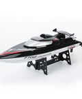 Eighteen Inch Brushless RC Speed Boat With Two Four GHz Remote Control Four Wheel Drive Watercraft on display stand