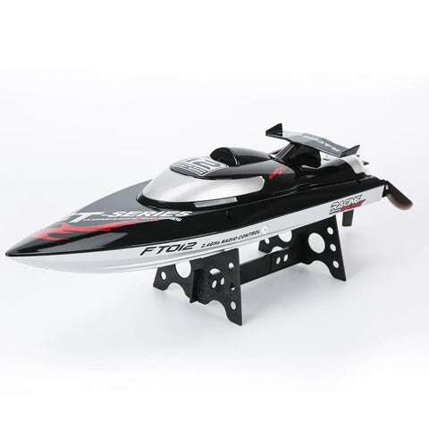 Eighteen Inch Brushless RC Speed Boat With Two Four GHz Remote Control Four Wheel Drive Watercraft on display stand