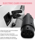Rock Solid Type One To Type Two EV Charger Adapter Meets Sae J1772 Standards And Ip54 Weatherproof Rating For Any American Electric Ride being plugged into a charging socket.