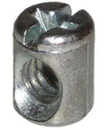 Close-up of Heavy Duty 1/4-20 Thread Cross Dowel Barrel Nut, silver die cast, for furniture assembly and woodworking.