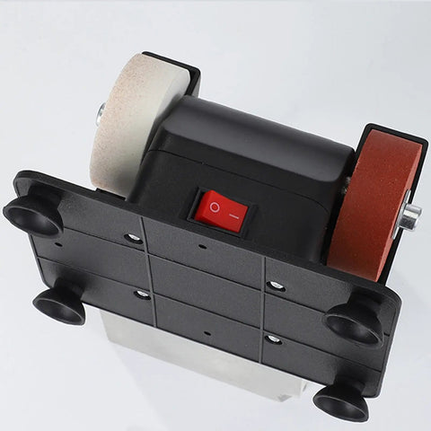 Real Deal Bench Grinder And Table Polisher Station Engineered For Swift Burr Removal Precision Blade Sharpening And Sleek Metal Polishing In Your Home Shop top view showing dual grit wheels and power switch.