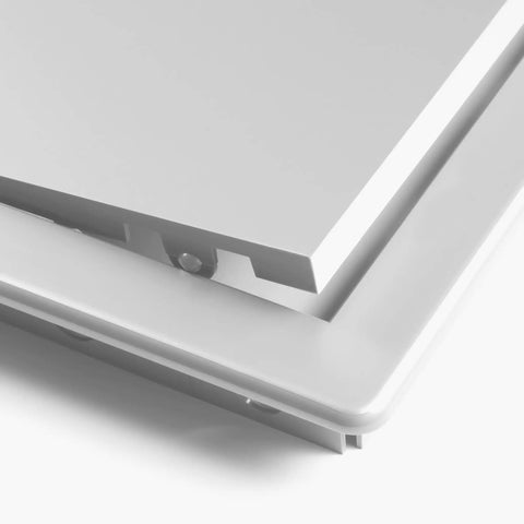 Close-up of 4 X 4 Inch Slick White Abs Plastic Access Panel For Drywall Walls Utility Service Hatch Door with secure flap cover.