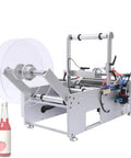 Semi Automatic Round Bottle Labeling Machine Fits 20 To 120 Mm Diameter High Speed Label Applicator showing clear spool and machine components.