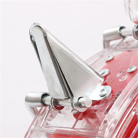 Close-up of durable metal precision garden seeder with clear seed storage box, focusing on metal component and fasteners.