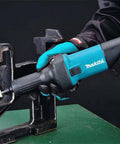 Rugged 3.5 Amp 1/4 Inch Die Grinder, 25000 RPM Bad Job Whacker With Chill Barrel Grip in use on metal work.