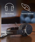 M20x Professional Studio Headphones For Mixing And Monitoring displayed beside a laptop, showcasing lightweight over-ear design.