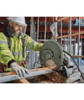 Worker using 14 Inch Segmented Rim Diamond Edge Cutoff Wheel For Metal For Cutoff Saws Dry Or Wet Use 4300 RPM 1 Inch Arbor