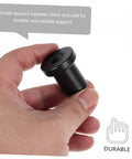 Hand holding a single iron spacer from the 4 Pack Barn Door Track Spacers Built Tough With Sturdy Carbon Steel Connectors For Sliding Doors