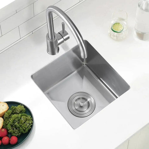 Top view of Heavy Duty 16 Gauge Stainless Steel Undermount Bar Sink 13 Inch By 15 Inch Exterior with faucet in modern kitchen setup