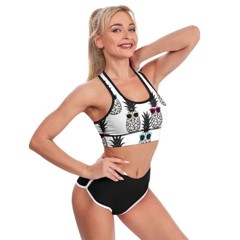 Woman wearing Pineapple Print Yoga Bra With Sunglasses Removable Padding Cross Back Sports Crop Top For Women Premium Fabric 86 Polyester 14 Spandex
