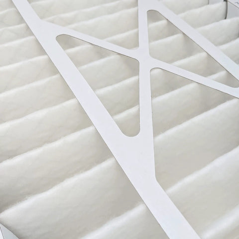 Close-up of MERV 8 Furnace And AC Air Filter 16x25x5 Inch two pack showing white pleated filter material and foam edging.