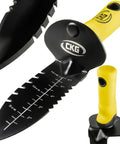 Close-up of Beefy Heavy Duty Metal Detector Shovel With Double Serrated Edge showing measurement markings and yellow handle.
