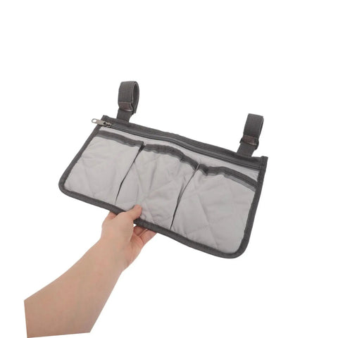 Bed Rail Organizer With Four Pockets And Cup Holder, Hanging Bedside Storage Caddy in gray fabric, shown with adjustable straps.