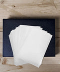 200 Pack White EPE Foam Packing Pouches For Moving And Mailing Parcels on wooden table