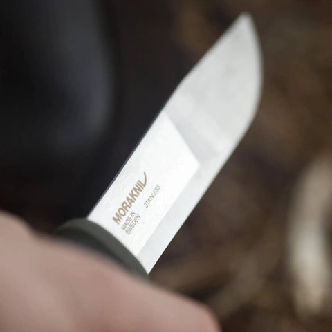Close-up of Kansbol Fixed Blade Survival Knife With Sheath in Military Green 4.3 Inch Stainless Steel Blade showing logo