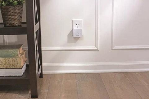 No Fuss Setup Smart WiFi Adapter For Sense Deadbolt, 2.4GHz Only, White Finish plugged into wall outlet in home setting