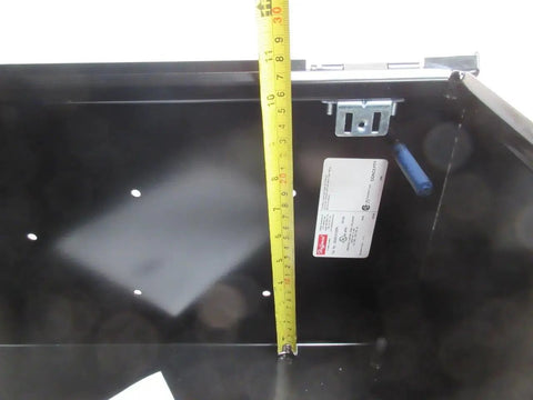 Interior view of black 20x16x10 Industrial Control Panel Enclosure NEMA 4 and 12, showing depth measurement with tape measure inside.