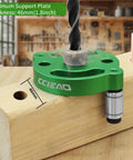 No Fuss Self Centering Doweling Jig Kit Boasting Anodized Aluminum Body and Heavy Duty High Speed Steel Bushings drilling into wood.