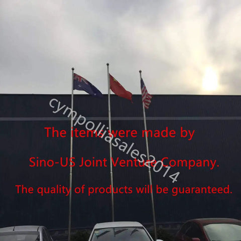 Heavy Duty 15 Foot 180 Amp Mig Welding Gun With Five Pin Connector Fits Titanium Unlimited 200 And Mig 140 170 For Smooth Wire Feeding Ready To Go displayed outside a factory with flags.