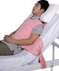 Man in adjustable Chenhon Criss Cross Chest Vest Restraint for patient safety, M Size, in bed, easy care cotton fabric.