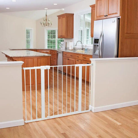 Extra Tall 36 Inch Wide Baby Gate With Door For Doorways And Pets in kitchen entrance, pressure-mounted on wooden floor.
