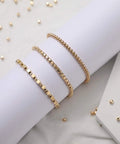 Assorted Spacer Beads Kit With 3000 Pieces Including 1500 4 Mm Faceted Rondelle Cube Beads, displayed in DIY bracelets on white paper