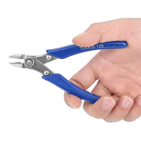 Hand holding 125 Multifunction Electrician Pliers for Wire Cutting with blue ergonomic grip and steel construction