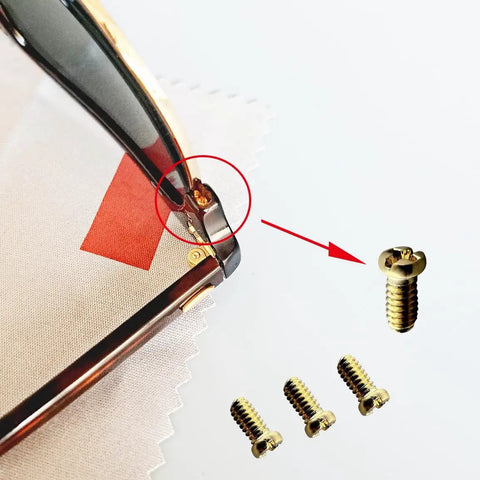 Close-up of Clubmaster Replacement Backside Lens Screws Set With Screwdriver showing golden screws and application on RB eyewear.