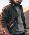 Man wearing Shotgun Shell Holder With 56 Hole Tactical Shoulder Strap For 12 Gauge Shells Adjustable Shotshell Bandolier Belt