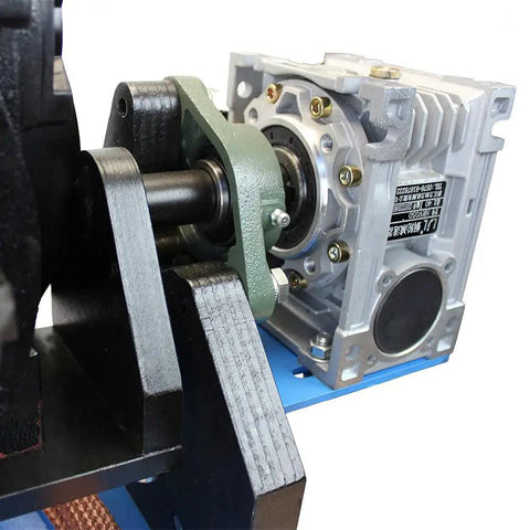 Close-up of Heavy Duty Rotary Welding Turntable With Eight Inch Chuck And Zero To Ninety Degree Tilt Base motor and components.
