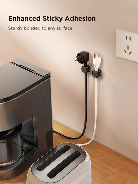 9 Pack Magnetic Cable Clips With Smooth Adjustable Slots Self Adhesive Cord Holders for under desk cable management shown on wall.