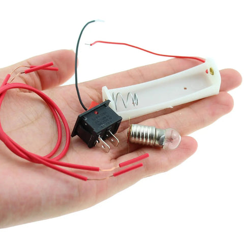 Close-up of a hand holding parts from Cool Hands On Circuit Experiment Kit For Electricity Learning DIY STEM Kit