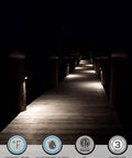 Waterproof IP65 rated Eight Pack Low Voltage LED Deck Lights Outdoor 12 To 24V AC DC Triangle Stair Railing Lights illuminating a wooden dock.