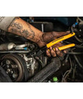Mechanic using Six Piece Dipped Mixed Material Pliers Set With High Leverage Joint For Pro Grade Thirty Five Percent More Cutting Power