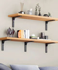 Rock Solid Metal Shelf Brackets Four Inch Square Design With Heavy Duty Wall Mounting Hardware Easy Peasy Installation For Countertops And Floating Shelves Built Tough And Ready To Install, supporting wooden shelves with decor.