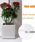 Potted plant with self adhesive noise dampening bumper pads 272 pcs in five sizes for surface protection and quiet closure.